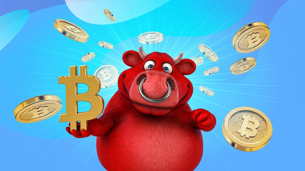 A red bull with a ring through it's nose stands in front of crypto coins and holds a gold symbol for Bitcoin in it's right hand.