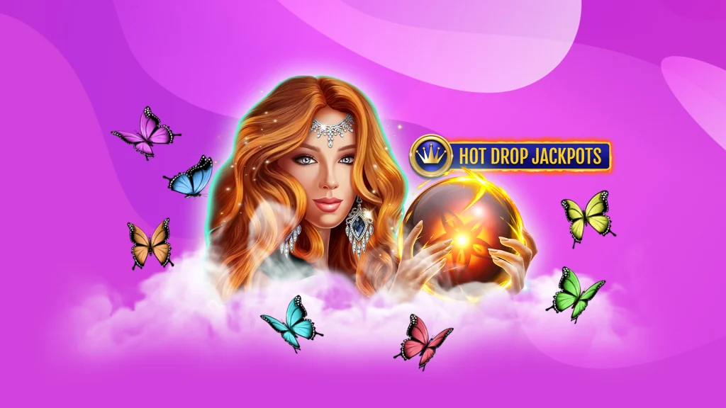 A woman with long red hair is holding an orange crystal ball as butterflies flutter around her head, and words say ‘Hot Drop Jackpots’ to her right, all with a purple background.