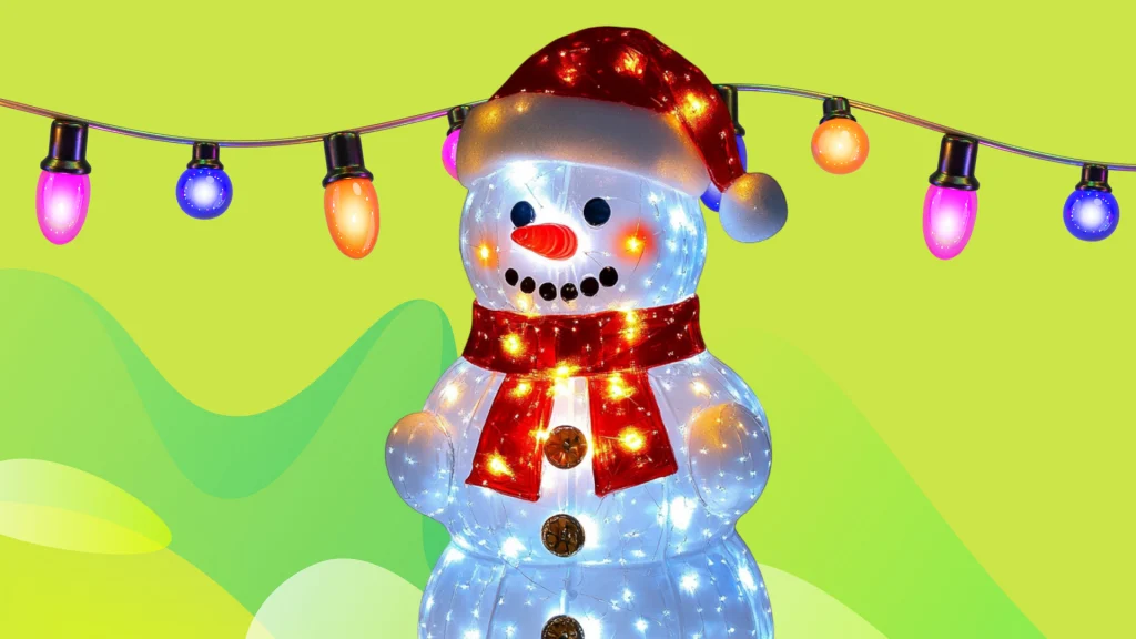 There’s a string of Christmas lights hanging above a glowing snowman, and everything is displayed on a bright green image